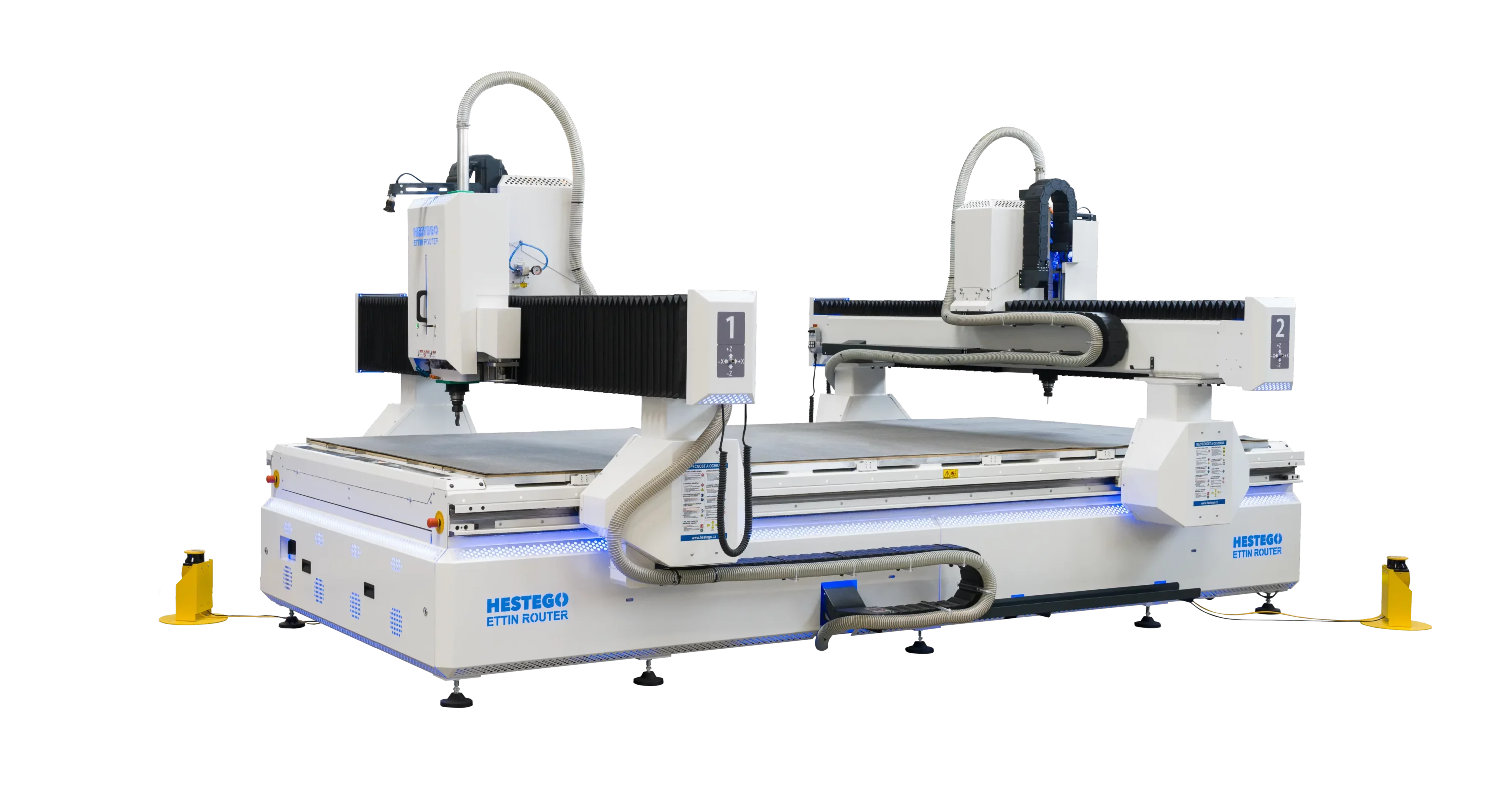 Dual-gantry CNC router on a white platform with blue accents and flexible hoses, labeled HESTEGO ETTIN ROUTER.
